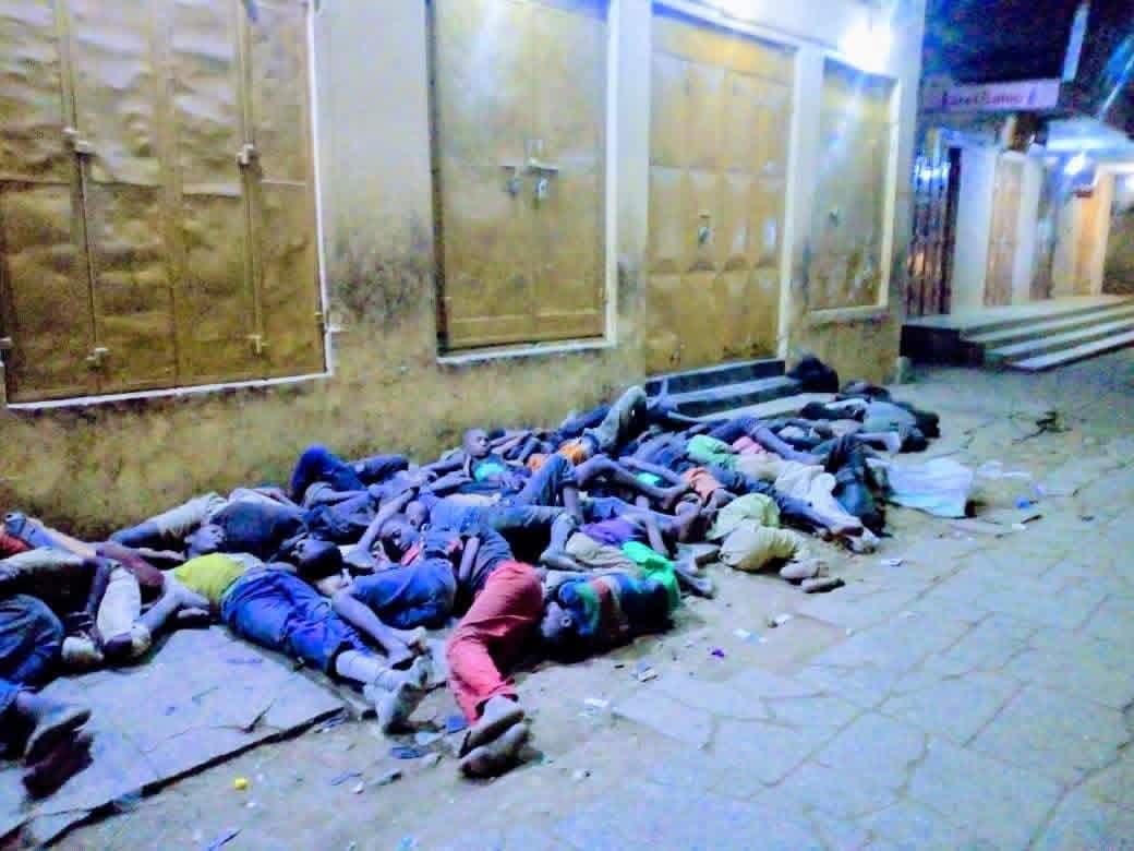 Children sleeping on the streets of Mbale at night